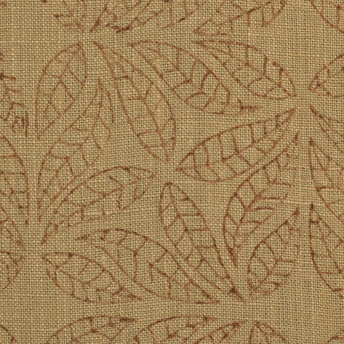 Close-up of the geometric leaf mandala block print detail on camel linen