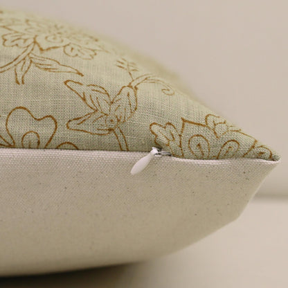 Close-up of hand block printed chintz jaal vine pattern on sage linen