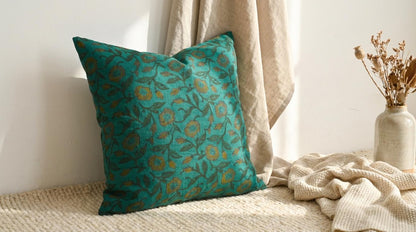 Fabric texture close-up of hand block printed teal wild rose linen