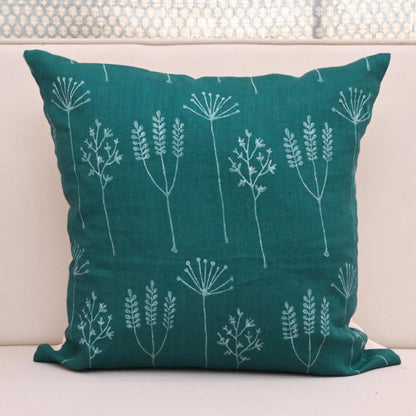 Teal wild meadow block print linen pillow cover styled on a sofa