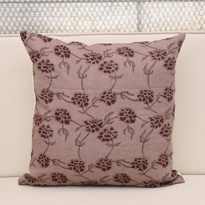 Dusty mauve linen pillow cover with hand block printed burgundy carnation vine, front view