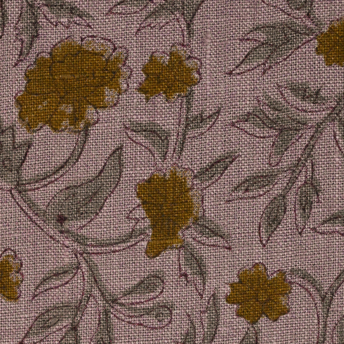 Close-up of the wild rose vine block print detail in charcoal and gold