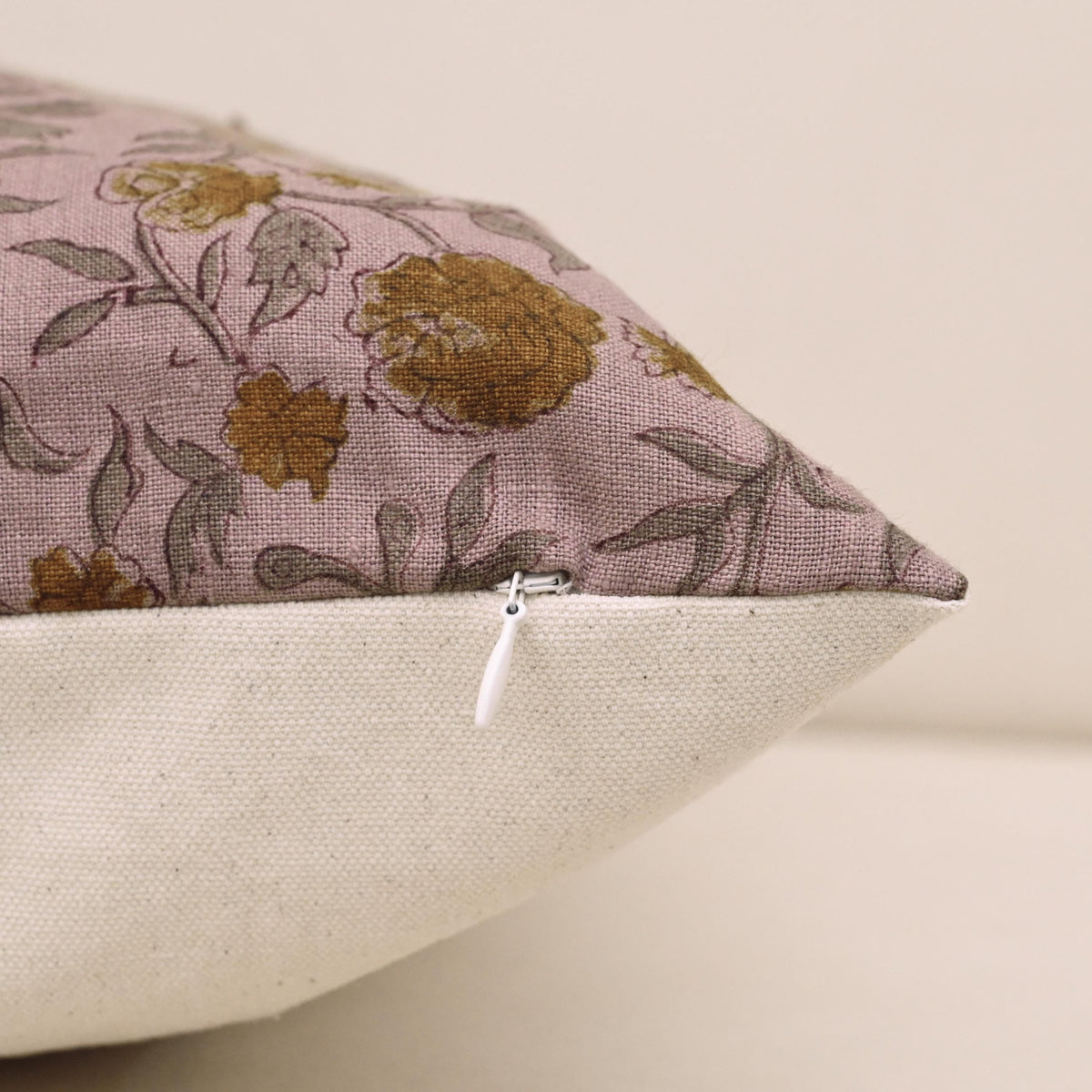 Corner and hidden zipper detail on Rustic carnation linen pillow cover