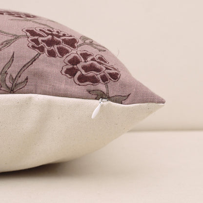 Corner and hidden zipper detail on mauve carnation linen pillow cover